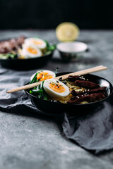 Japanese ramen soup on dark background