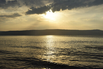 Sunset over the Sea of Galilee and Golan Heights. High quality photo.