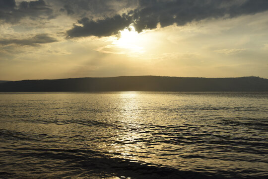 Sunset over the Sea of Galilee and Golan Heights. High quality photo.