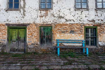 Fototapeta na wymiar Old door and window on the old wall brick