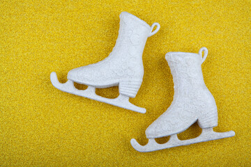 image of skates gold background