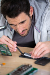 man during repair of wi-fi router