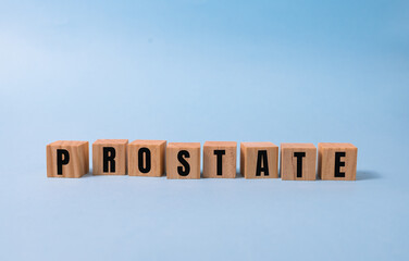 PROSTATE word made with building blocks on blue