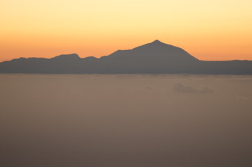 Fototapeta na wymiar Island of Tenerife and Teide peak at sunset from Gran Canaria. Canary Islands. Spain.