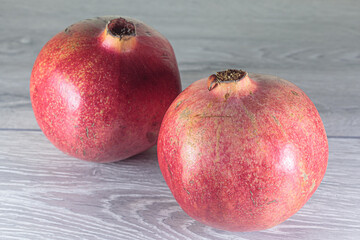 Juicy ripe pomegranates. Concept of vegan food.