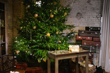 Gifts christmas tree merry on green background. New year party. Christmas tree and gifts