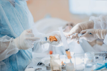 preparation of fat cells for lipofilling in the operating room. Surgical cosmetic surgery to...