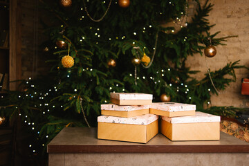 Gifts christmas tree merry on green background. New year party. Christmas tree and gifts