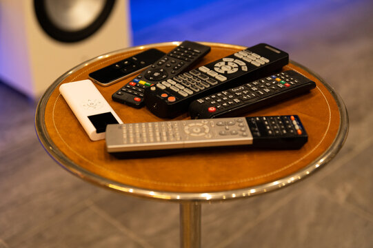 A Bunch Of Too Many Remote Controls For Home Entertainment - Remote Control Overload