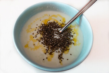 a breakfast bowl of yogurt with chia and honey 