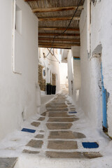 A street in the old town of Chora, the capital of Ios Island. Traditional Cycladic architecture. Greece
