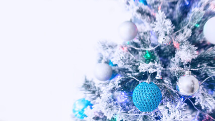 Fototapeta na wymiar isolated christmas tree with balls and lights