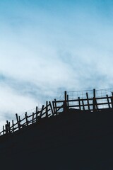 fence against blue sky