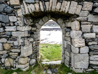 Fototapeta na wymiar The historic St. Marys church on the Island of Inishkeel by Portnoo in County Donegal