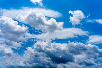 Blue sky background of white clouds floating