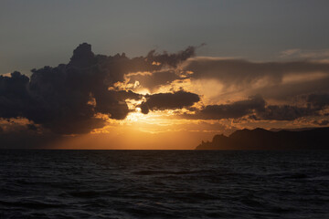 Fototapeta na wymiar Beautiful sunset by the sea on the Crimean coast