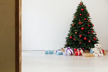 Christmas interior of the home Christmas tree presents the new year as a backdrop