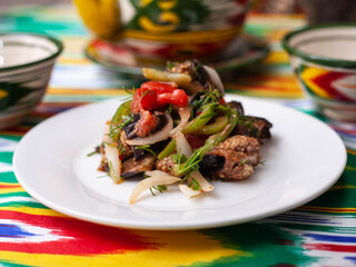  warm salad of green and red peppers, meat, eggplant, onions and tomatoes Asian style