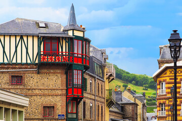 Etretat, Normandy, France. Medieval house, picturesque landscape of Etretat commune, view of the ancient city - obrazy, fototapety, plakaty