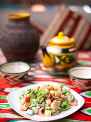  Fried beef meat in oil with potatoes, onions, bell peppers according to the Uyghur recipe