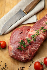 Raw Meat Sliced Pieces Of Beef With Spices And Herbs On A Wooden Board 