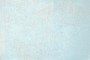 Gentle blue background. Oxidized metal texture with brass and aqua patina, rusty metal surface with rust streaks.