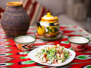 Tomato, cucumber, sweet pepper and onion salad, seasoned with oil. Asian style