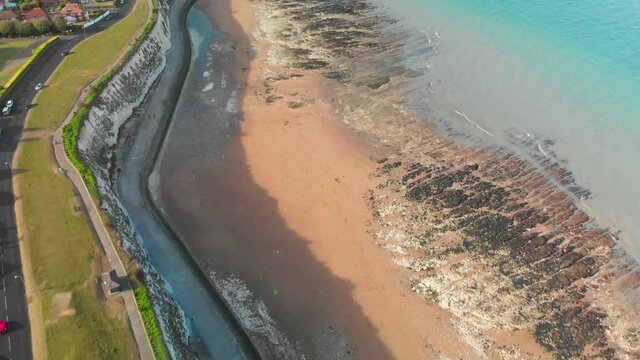 Drone aerial view of the beach and white cliffs, Margate, England, UK