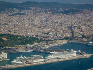 Aerial view of modern big cruiseships or cruise ship liners in port of Barcelona, Spain with...