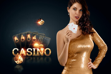 A beautiful young girl in a gold dress holds playing cards in her hands on a dark background,...