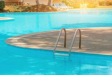 Swimming pool with pool ladder
