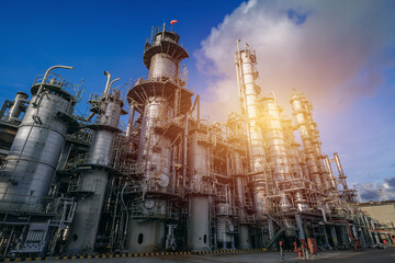 Oil and gas refinery industry on blue sky background, Manufacturing of petroleum industrial plant