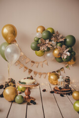 stylish photo zone in beige and green tones