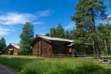 Old wooden houses on a village street in Northern Russia