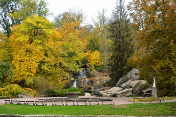 Autumn colors in the National Dendrology Park of Sofiyivka, Uman, Ukraine. Waterfall in the park.