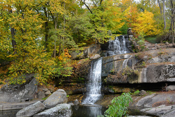 Autumn colors in the National Dendrology Park of Sofiyivka, Uman, Ukraine. Waterfall in the park.