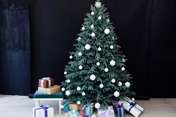 Christmas tree with gift decoration decor balls garlands new year interior
