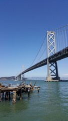 Naklejka premium Oakland Bay Bridge with a clear blue sky