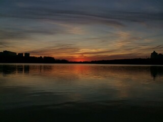 Naklejka premium sunset over the river