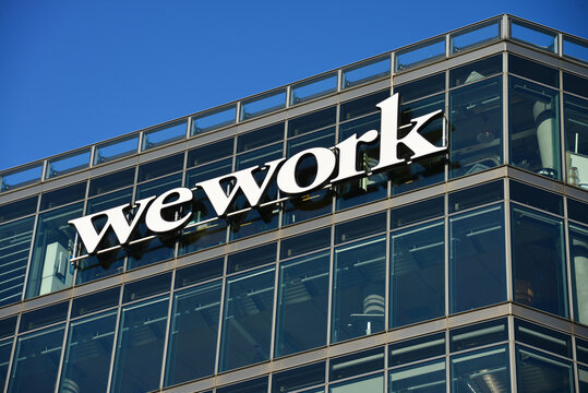 Berlin / Germany - September 22, 2019: The wework logo in Berlin, Germany - wework is a global network of workspaces for freelancers, startups an small business