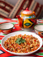  An oriental dish lagman - homemade noodles fried with meat and vegetables. Eastern cuisine