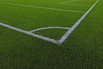 Artificial grass soccer field. Corner kick line of ball and a soccer field , football field , background texture