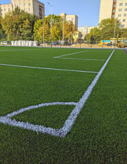 Artificial grass soccer field. Corner kick line of ball and a soccer field , football field ,...