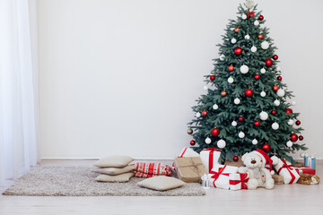 Christmas tree with gift decoration balls garlands new year interior