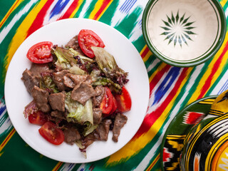  Uyghur fried meat with pepper and vegetables. Asian style