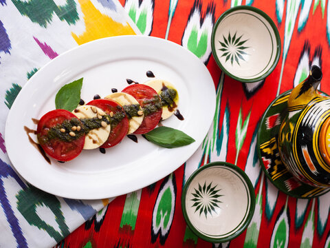  Italian caprese salad with tomatoes, mazzarella cheese and balsamic sauce. Asian style