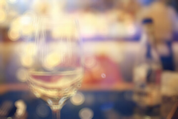 evening in a restaurant, blurred abstract background, bokeh, alcohol concept, wine glasses in a bar