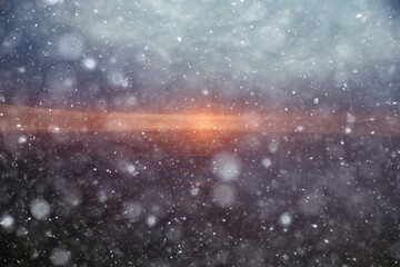 abstract blurred background, snow falls on the sea, northern cold sea, climate winter view