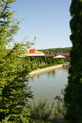 A look between the trees at the summer lake recreation complex