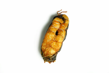 piece of hot smoked wolffish on white plate, Anarhichadidae, delicious beer snack
